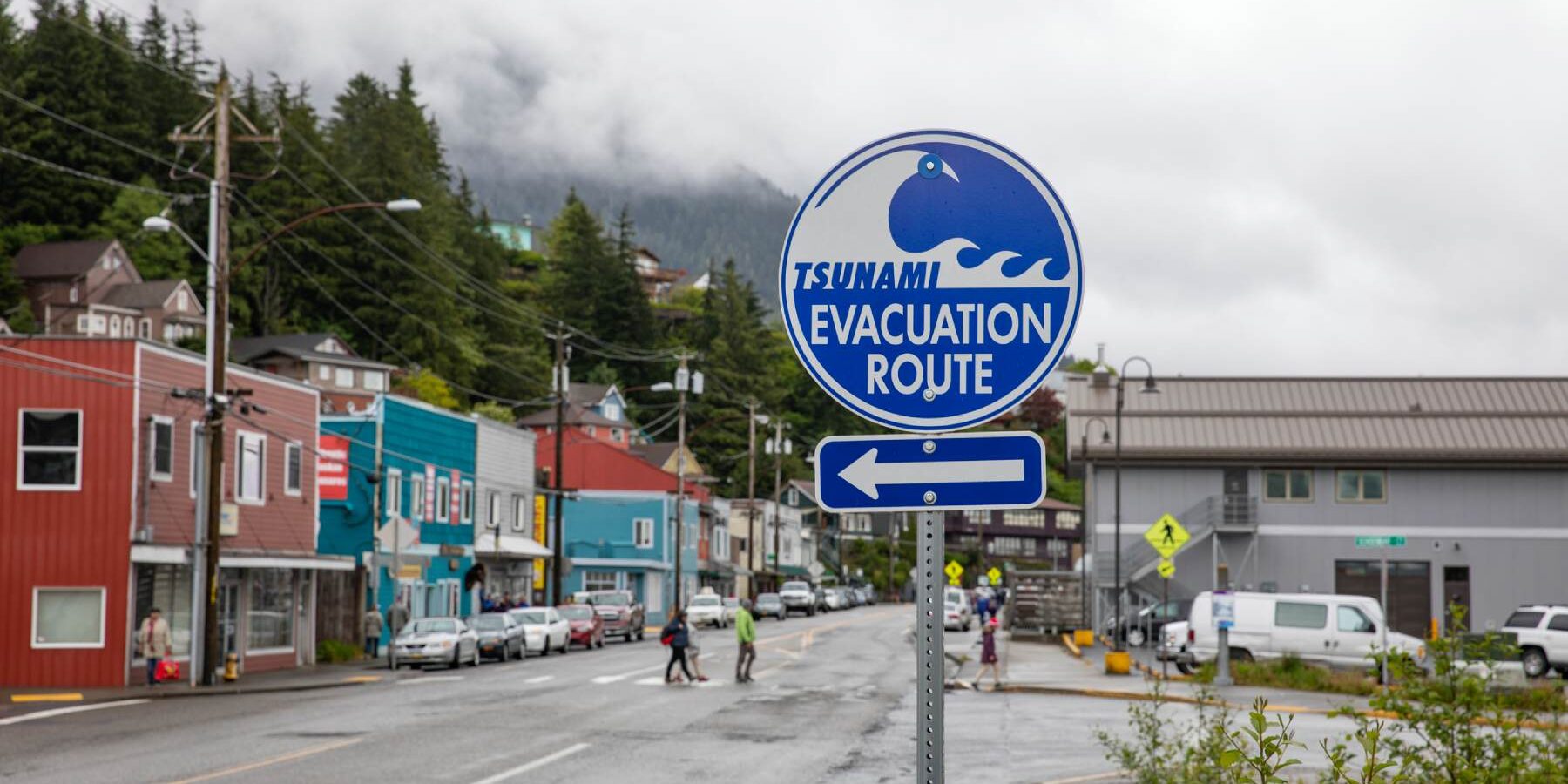 an tsunami evacuation route sign in a small town in America