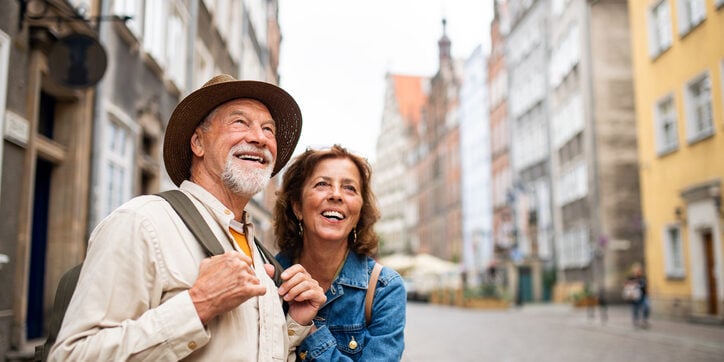 Happy, senior couple enjoying one of their trips, while knowing they are protected by travel insurance for seniors.