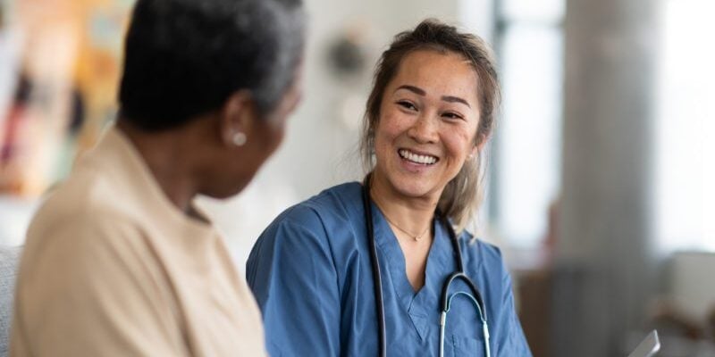 thailand doctor with patient