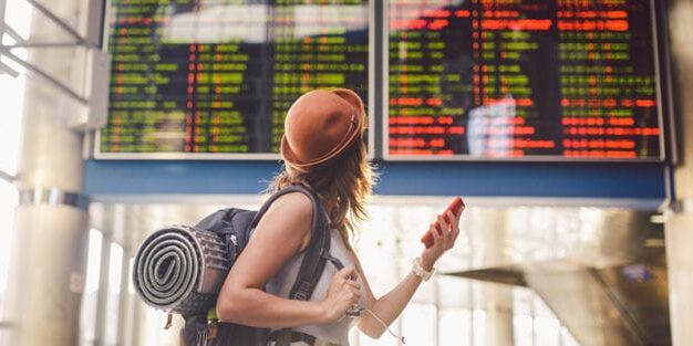 woman calling to cancel trip insurance because flight is cancelled