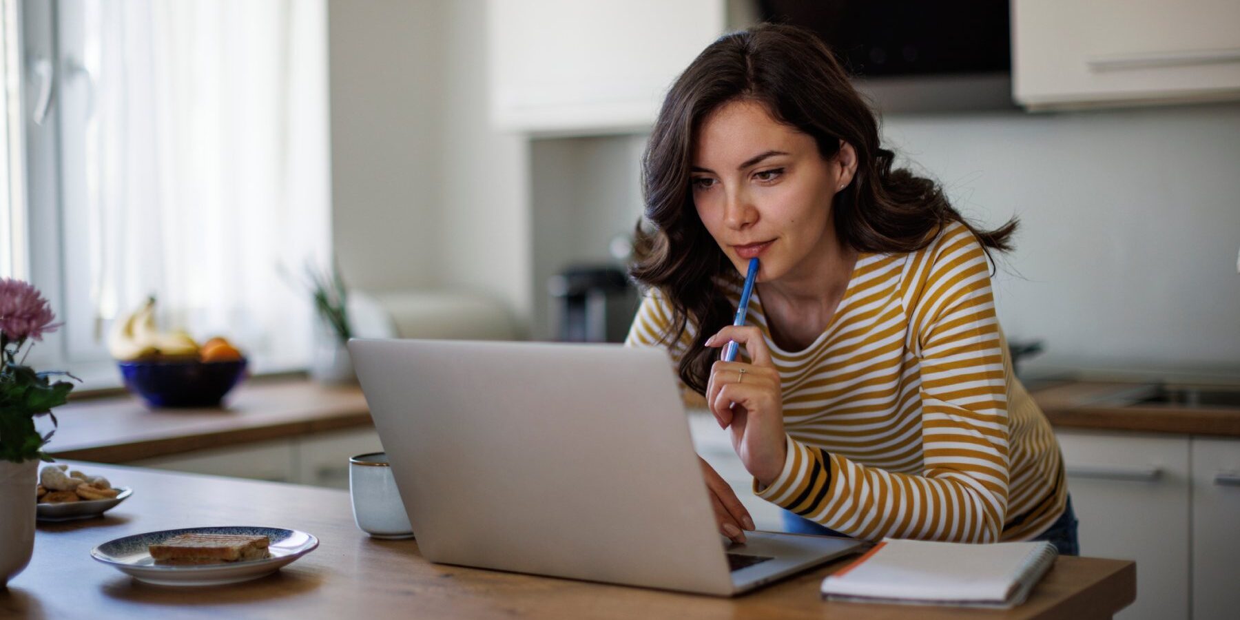 a woman reading tips for finding a doctor abroad